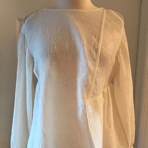 3.1 PHILLIP LIM TOP WITH RUFFLE HEM. SIZE: 0.